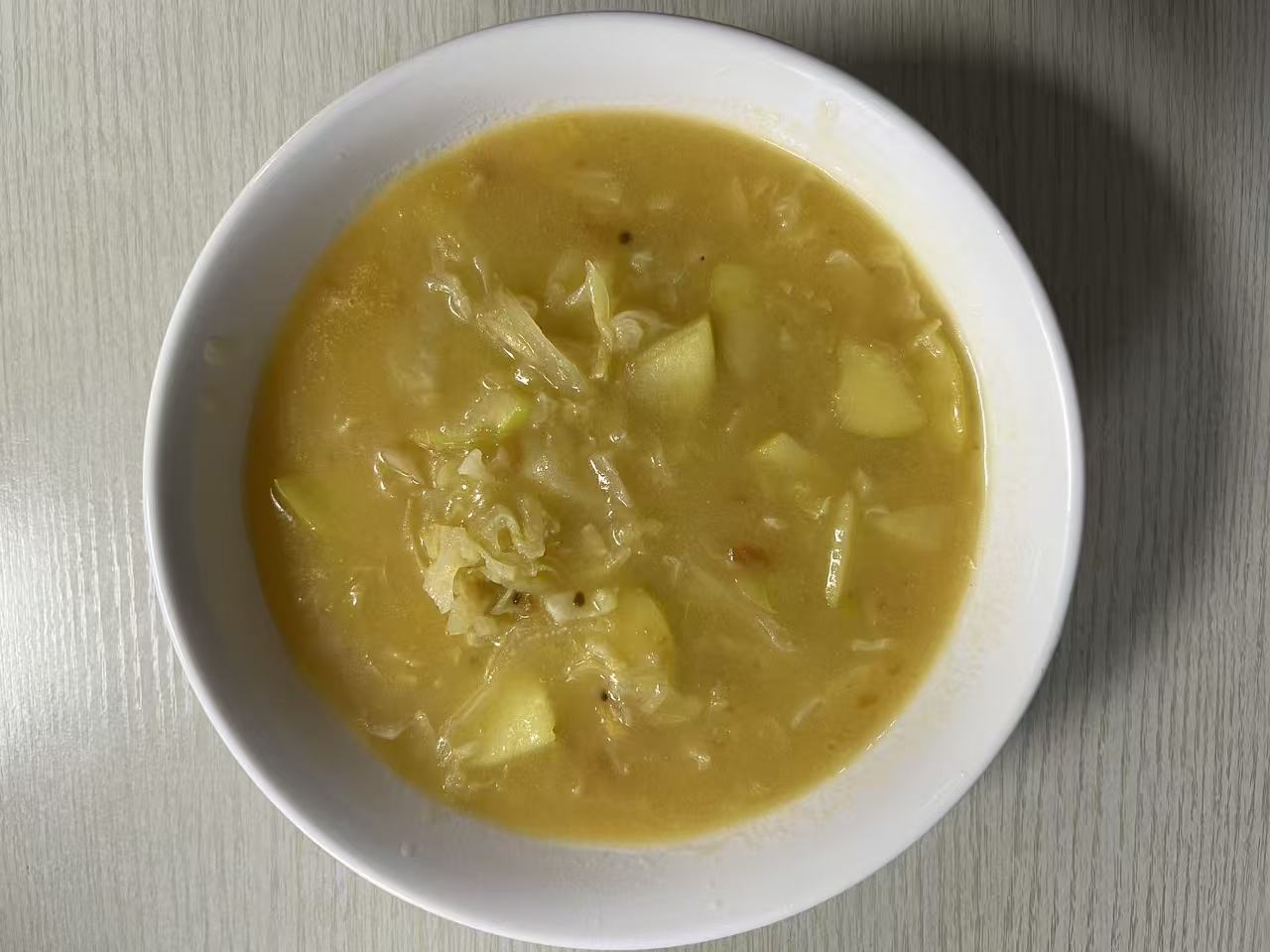 萝卜卷心菜小米面粥
